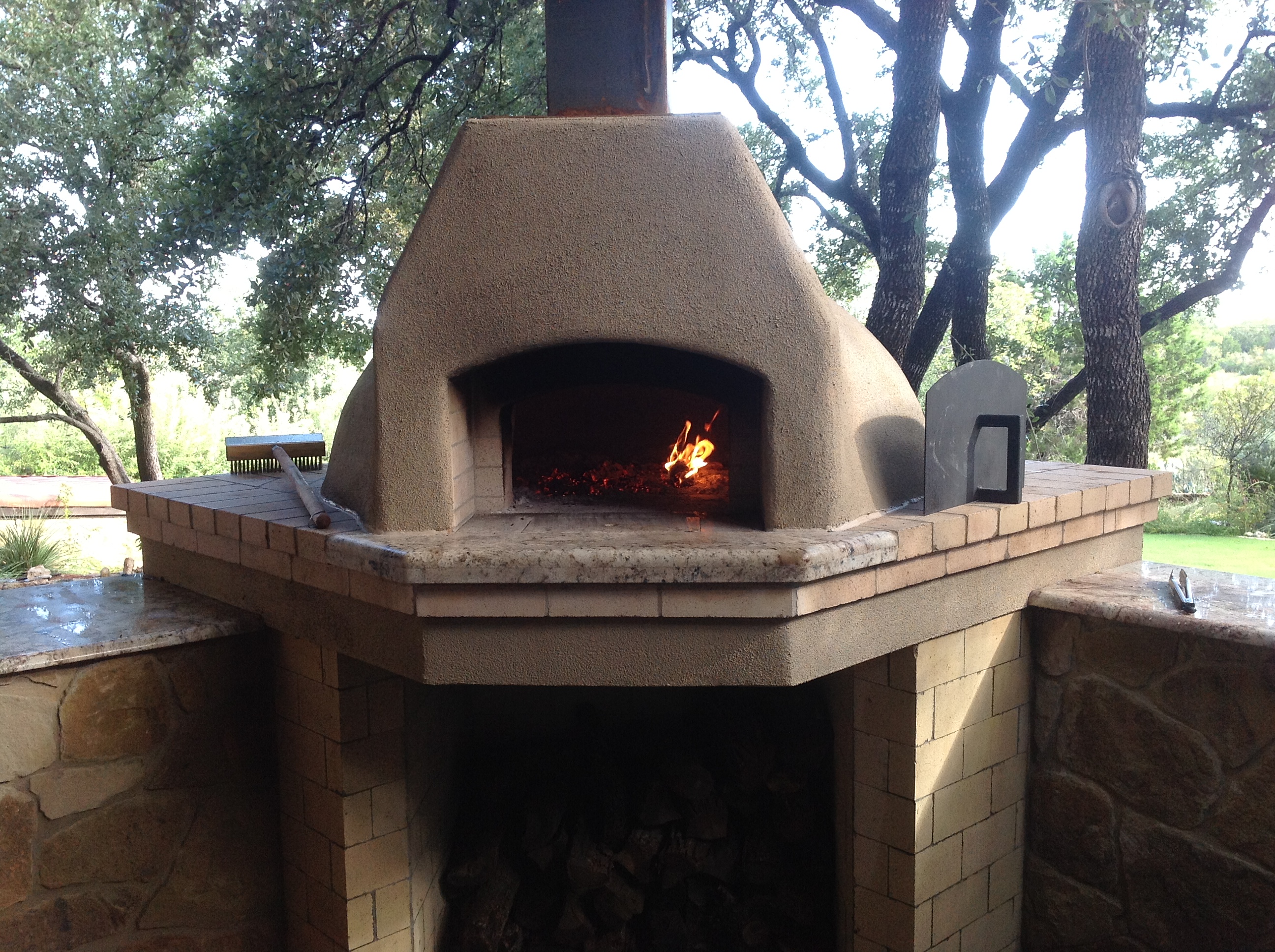http://texasovenco.com/wp-content/uploads/2013/10/pizza-oven-curing-wood.jpg