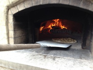 pre-bake-pizza-dough-in-wood-fired-oven