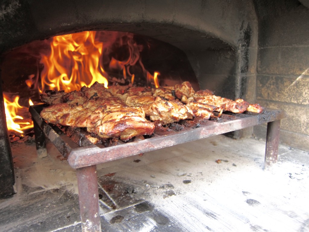 chicken drumsticks in and wings wood-burning oven pizza oven