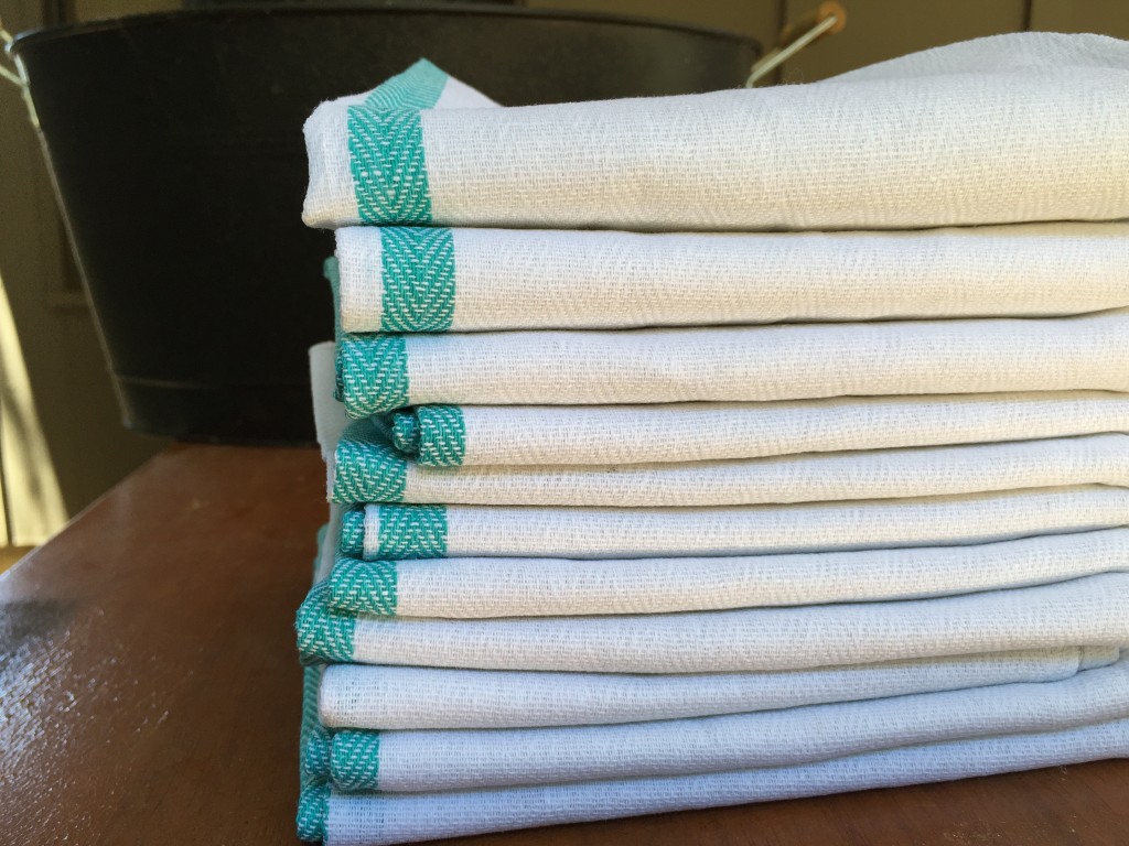 Keep a stack of restaurant bar towels on hand. They make it easy to keep things clean and double as on-the-go potholders.