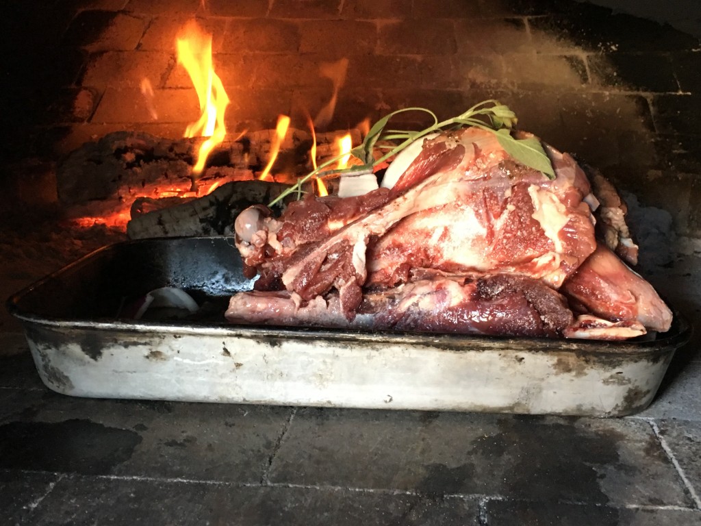venison bones roasting in wood-fired oven for building better bone broth