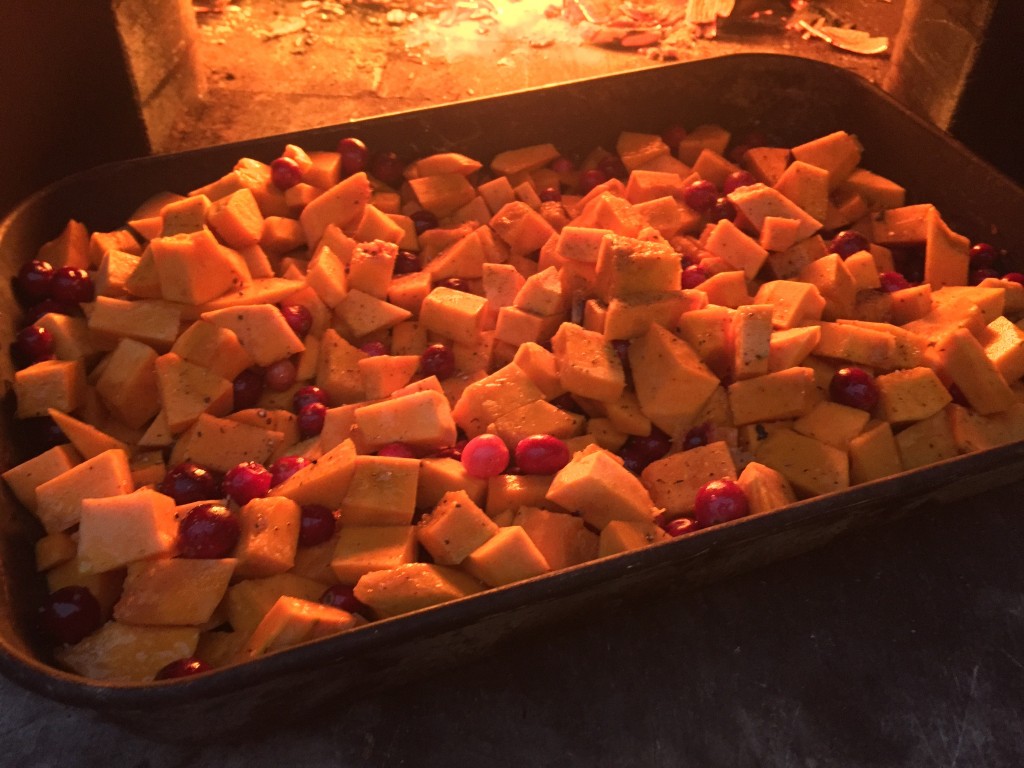 roasting cranberries in a wood-burning oven