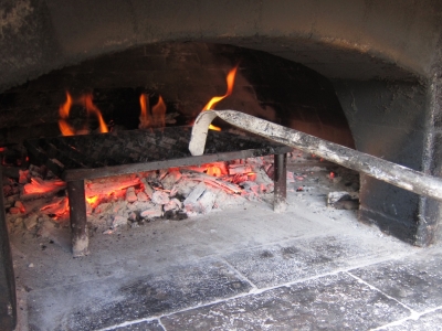 wood-fired grilling in a pizza oven wood-fired grilling in a wood-burning oven